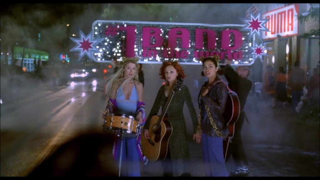 Tara Reid, Rachel Leigh Cook and Rosario Dawson as the #1 pop band in Josie and the Pussycats, the brilliant pop satire