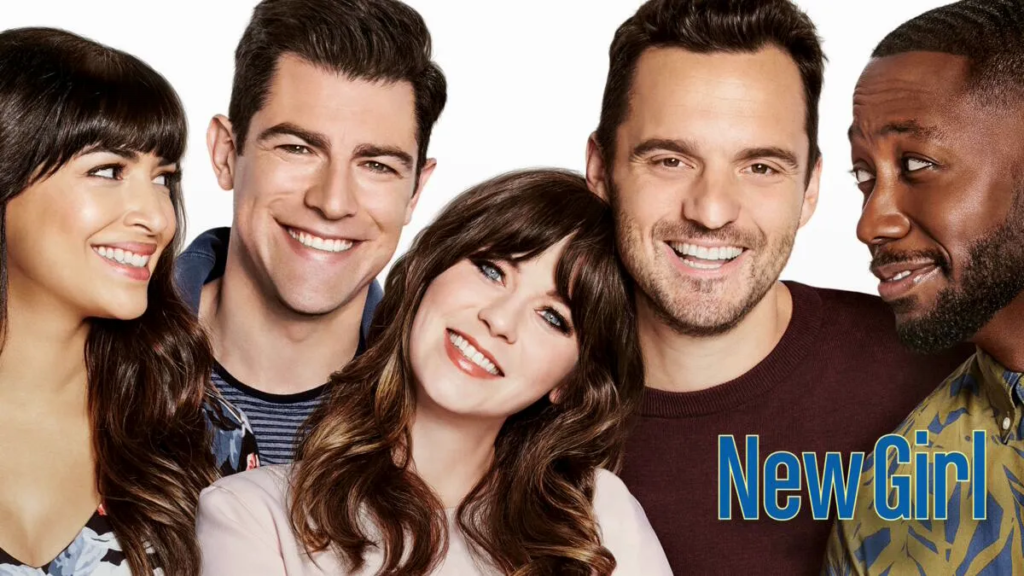 Zooey Deschanel as Jess Day with the rest of the cast of New Girl