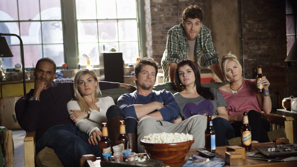 The cast of the sitcom Happy Endings on set