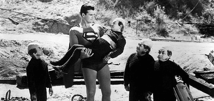 George Reeves in the 1951 film Superman and the Mole Men carrying a creature to safety. Superman Movie Ranking,