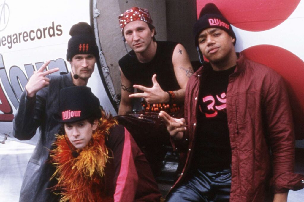 Seth Green, Breckin Meyer, Donald Faison and Alexander Martin as the pop band Dujour in Josie and the Pussycats