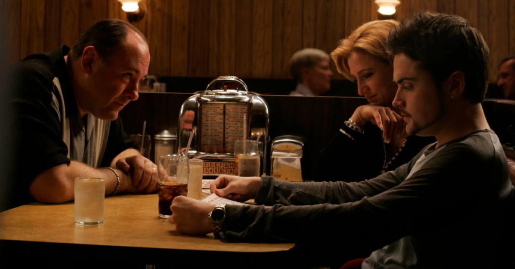 James Gandolfini as Tony Soprano, Edie Falco as Carmela Soprano and Robert Iler as A.J. Soprano.