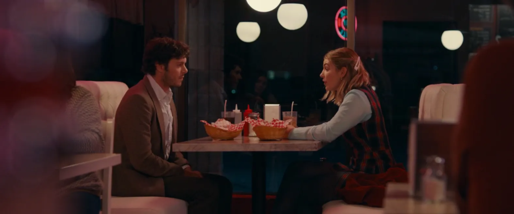 Adam Brody and Sophie Nélisse in The Kid Detective (2020)