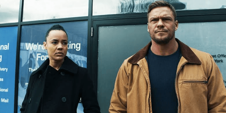 Maria Sten as Neagley and Alan Ritchson as Jack Reacher in Reacher (2022).